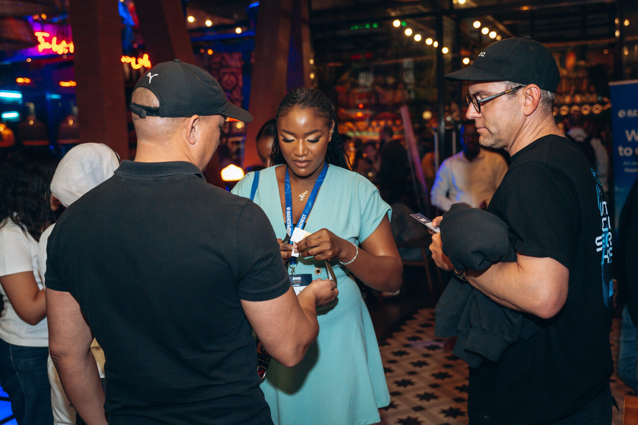 Beverly Ezebuike networking with fintech founders and partners, featured in Tech Economy